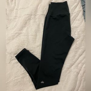 Alo dark green mid rise yoga pants.